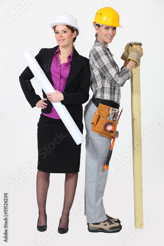 Photo: An architect and her carpenter. An architect and her carpenter.