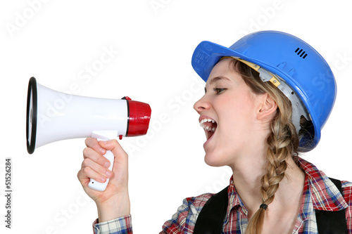 Photo: Female preaching with megaphone Female preaching with megaphone