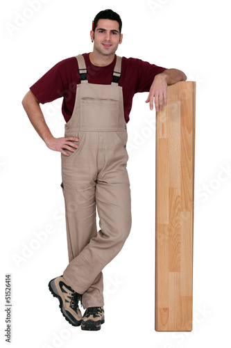 Photo: Man with wooden flooring Man with wooden flooring