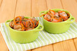 Stuffed cabbage rolls in pan on table