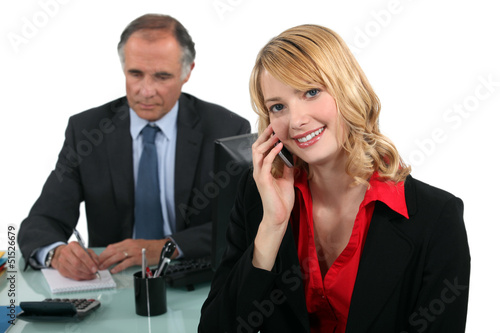 Photo: Boss and young female assistant Boss and young female assistant