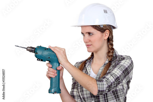 Photo: Woman with a drill Woman with a drill