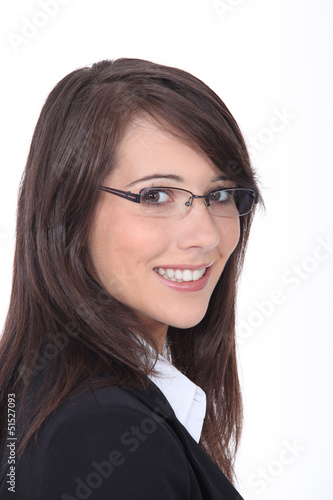 Photo: Young businesswoman wearing glasses Young businesswoman wearing glasses