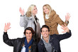 two young couples posing together