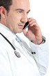 Doctor on phone smiling