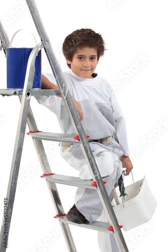 Photo: Young boy painting Young boy painting