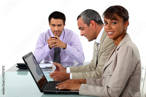 Photo: A businessteam at work. A businessteam at work.