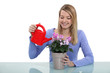 Woman watering plant