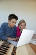 Foto: Brother and sister doing their homework together Brother and sister doing their homework together