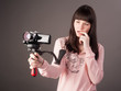 young woman with video camera