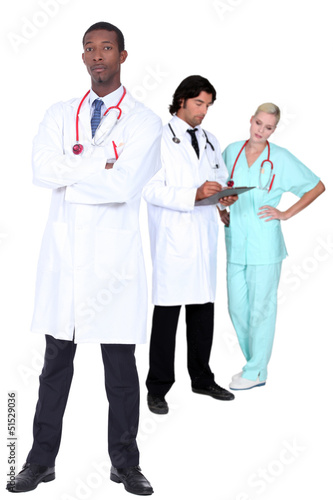 Photo: Three medical workers Three medical workers