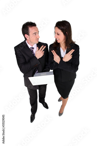 Photo: Determined and competitive business people Determined and competitive business people