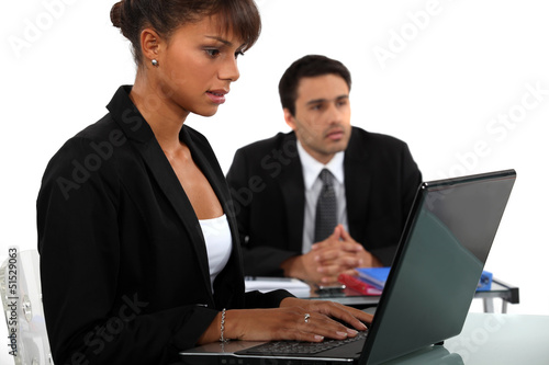 Photo: woman using laptop woman using laptop