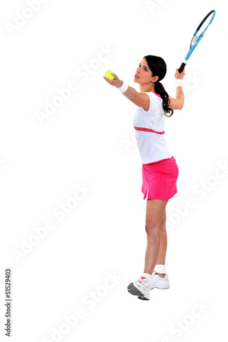 Photo: Woman playing tennis Woman playing tennis