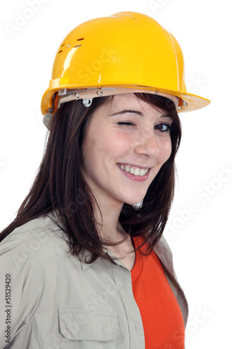 Photo: Wink from a female construction worker Wink from a female construction worker