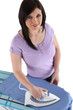 Foto: Brunette woman ironing Brunette woman ironing