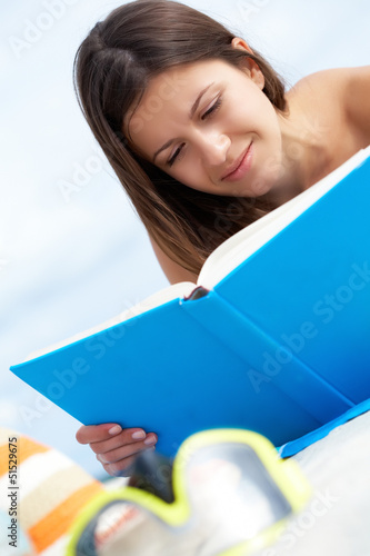 Photo: Reading on the beach Reading on the beach