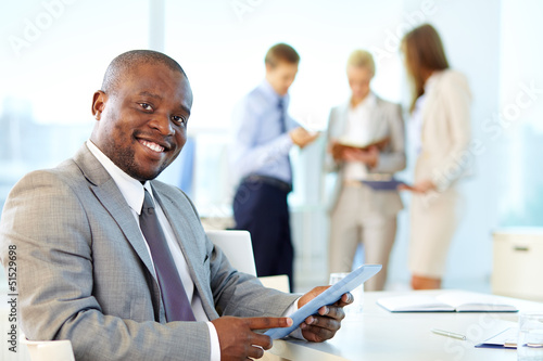 Photo: Businessman with touchpad Businessman with touchpad