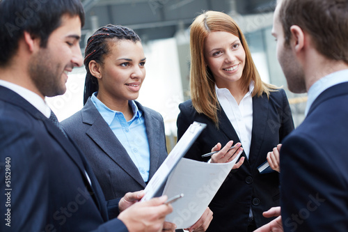 Photo: Talking at meeting Talking at meeting
