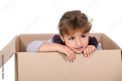 Photo: Girl in a cardboard box Girl in a cardboard box