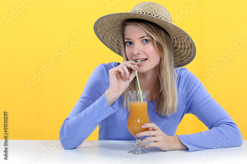Photo: Woman drinking juice Woman drinking juice