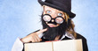 Inquisitive scientist holding open theory book