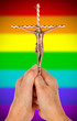 Old woman with catholic crucifix, isolated, rainbow flag pattern