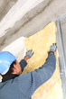Man insulating wall