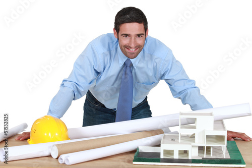Photo: An architect in his office. An architect in his office.