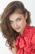 Young girl in a red blouse