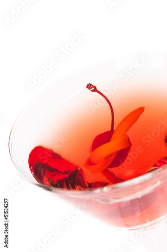 Photo: Manhattan Cocktail top view close-up on white background Manhattan Cocktail top view close-up on white background