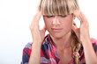 portrait of a woman with headache