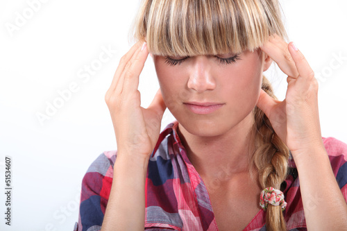 Photo: portrait of a woman with headache portrait of a woman with headache