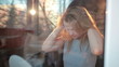 Video: Through the window portrait of girl enjoying her hair. Through the window portrait of girl enjoying her hair.