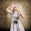 Photo: Grunge girl with retro film camera concept framing Grunge girl with retro film camera concept framing
