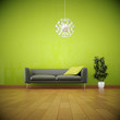 Ledersofa vor grüner Wand