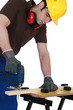 craftsman working with a drill