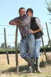 Foto: young couple of farmers young couple of farmers
