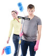 Wife wants to clean the house with irritated man holding vacuum 
