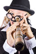 Businesswoman looking through telescope