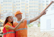 Portrait of two builders