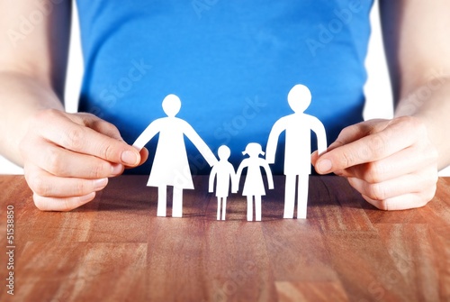 Photo: holding a family holding a family
