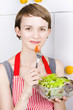 Photo: Pretty woman holding salad bowl Pretty woman holding salad bowl