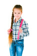 girl with long braid in a plaid shirt and jeans