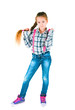 girl with long braid in a plaid shirt and jeans
