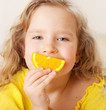 Child with oranges