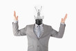 Photo: Businessman and light bulb Businessman and light bulb
