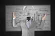 Photo: Businessman stressing with light bulb head breaking Businessman stressing with light bulb head breaking