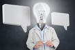 Photo: Man with light bulb for a head and two speech bubbles Man with light bulb for a head and two speech bubbles