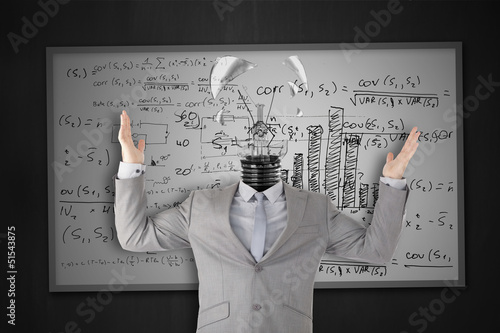 Photo: Businessman stressing with light bulb head breaking Businessman stressing with light bulb head breaking